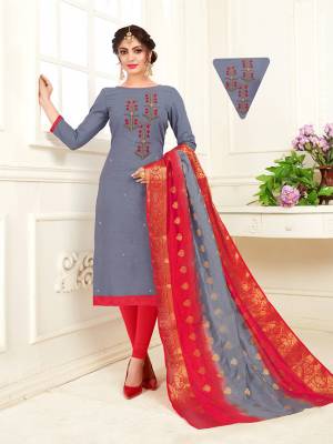 Flaunt Your Rich And Elegant Taste With This Subtle Color Pallete Designer Straoght Suit. Its Top Is In Grey Color Paired With red Colored Bottom And Red And Grey Dupatta. Its Top And Bottom Are Cotton Based Paired With Banarasi Dupatta. Buy This Dress Material Now.