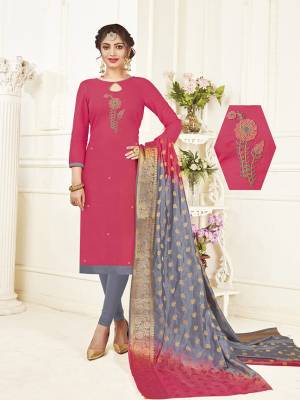Bright And Visually Appealing Color Is Here With This Designer Straight Suit In Dark Pink Colored Top Paired With Contrasting Grey Colored Bottom And Pink & Grey Shaded Dupatta. This Dress Material Is Cotton Based Beautified With Hand Work Paired With Banarasi Dupatta. 
