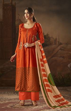 For An Elegant Festive Look, Grab This Designer Dress Material In Orange Color. Its Top And Bottom Are Fabricated On Cotton Paired With Chiffon Dupatta. Buy Now.