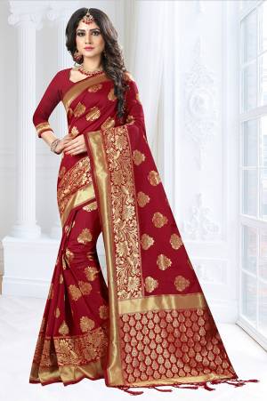 Enhance Your Personality In This Designer Silk Based Saree. This Saree Is Fabricated On Banarasi Art Silk Paired With Art Silk Fabricated Blouse Beautified With Weave All Over It. Also It Is Durable And Easy To Drape.