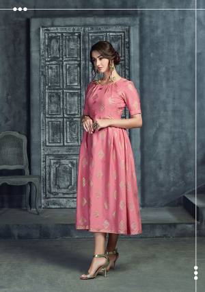 Look Pretty In This Readymade Designer Kurti In Pink Color Fabricated On Rayon. It Is Beautified With Foil Print And buttons, Also It Is Available In All Regular Sizes Which Is For All Age Group. 