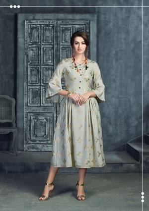 Rich And Elegant Looking Designer Readymade Kurti Is Here In Grey Color Fabricated On Rayon. This Readymade Kurti Is Beautified With Foil Prints And Buttons, Its Fabric Is Soft Towards Skin And Ensures Superb Comfort All Day Long. 