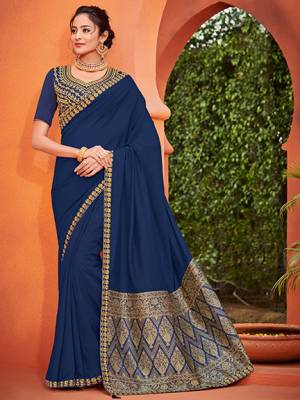 Wear this Blue color silk fabrics saree. this party wear saree won't fail to impress everyone around you. this gorgeous saree featuring a beautiful mix of designs. Its attractive color and designer heavy embroidered silk design, stone design, beautiful floral design work over the attire & contrast hemline adds to the look. Comes along with a contrast unstitched blouse.