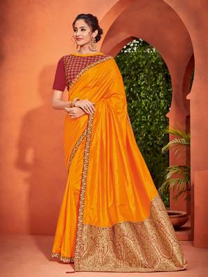 Presenting this Musturd yellow color two tone silk fabrics saree. look gorgeous at an upcoming any occasion wearing the saree. this party wear saree won't fail to impress everyone around you. Its attractive color and designer heavy embroidered silk design, stone design, beautiful floral design work over the attire & contrast hemline adds to the look. Comes along with a contrast unstitched blouse.