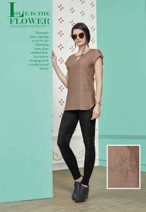 You Will Earn Lots Of Compliments Wearing This Designer Readymade Top In Light Brown Color Fabricated On Muslin Cotton. This Top IS Light Weight And Easy To Carry All Day Long.