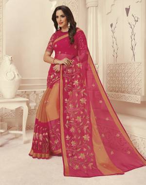 Shine Bright In This Attractive Color Pallete Wearing This Saree In Dark Pink Color Paired With Dark Pink Colored Blouse. This Saree Is Fabricated On Brasso Paired With Art Silk Fabricated Blouse. This Saree And Blouse Are Beautified With Multi Colored Thread Work. 