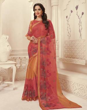 Shine Bright In This Attractive Color Pallete Wearing This Saree In Red Color Paired With Red Colored Blouse. This Saree Is Fabricated On Brasso Paired With Art Silk Fabricated Blouse. This Saree And Blouse Are Beautified With Multi Colored Thread Work. 