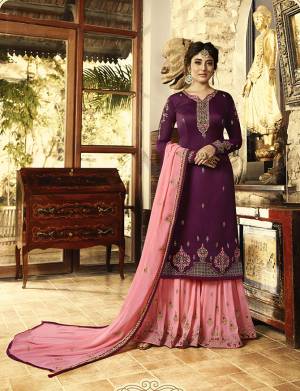 Look Beautiful In This Girly Color Pallete Wearing This Designer Suit In Wine Colored Top Paired With Contrasting Pink Colored Bottom And Dupatta. Its Top Is Fabricated On Satin Georgette Paired With Georgette Fabricated Bottom And Dupatta. Its Fabrics Are Soft Towards Skin And Ensures Superb Comfort All Day Long.  