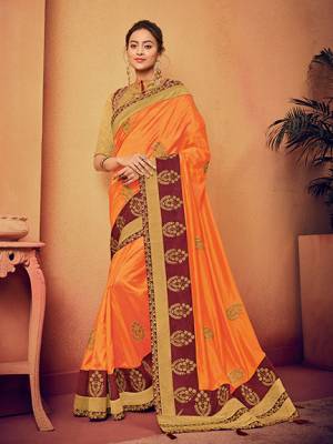 The fabulous pattern makes this orange color two tone silk fabrics saree. Ideal for party, festive & social gatherings. this gorgeous saree featuring a beautiful mix of designs. Its attractive color and designer floral design, stone work over the attire & contrast hemline adds to the look. Comes along with a contrast unstitched blouse.
