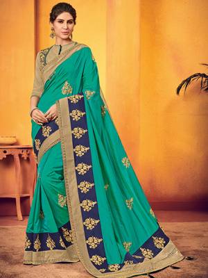 Look attractively Gorgeous and Beautiful after wearing this beautiful Sea green color two tone silk fabrics saree. this party wear saree won't fail to impress everyone around you. this gorgeous saree featuring a beautiful mix of designs. Its attractive color and designer floral design, stone work over the attire & contrast hemline adds to the look. Comes along with a contrast unstitched blouse.