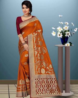 Celebrate This Festive Season Wearing This Silk Based Saree Beautified With Attractive Weave. This Pretty Saree Is Fabricated On Moonga Art Silk Paired With Art Silk fabricated Blouse. This Saree Is Light Weight, Durable And Easy to Carry All Day Long. Buy Now.