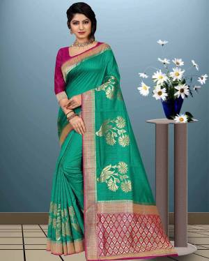 Grab This Designer Saree For The Upcoming Festive Season. This Saree Is Fabricated On Moonga Art Silk Paired With Art Silk Fabricated Blouse. This Rich Silk Based Saree And Its Weave Will Earn You Lots Of Compliments From Onlookers. 