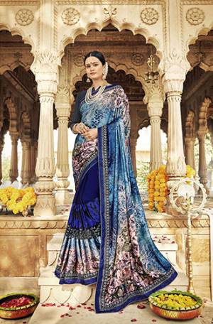 Catch All The Limelight Wearing This Designer Saree In Blue And Royal Blue Color Paired With Navy Blue Colored Blouse. This Saree Is Fabricated On Satin Georgette And Net Paired With Art Silk Fabricated Blouse. Both The Fabrics Are Light Weight And Easy To Carry All Day Long. 