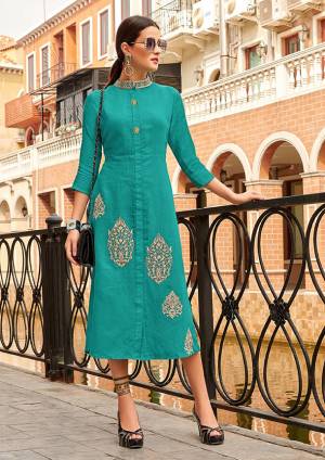 Adorn A Pretty Formal Look Wearing This Readymade Kurti In Turquoise Blue Color Fabricated On Cotton. It Is Beautified With Thread Embroidery. Buy Now.