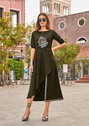 Add This Pretty Readymade Kurti To Your Wardrobe In Dark Green. This Pretty Kurti Is Cotton Based Which Ensures Superb Comfort All Day Long. 