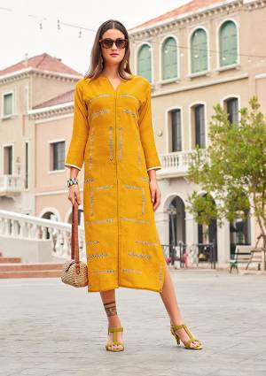 For Your Office Or Semi-Casual Wear, Grab This Readymade Kurti In Yellow Color Fabricated On Cotton Beautified With Light Thread Work. It Is Available In All Regular Sizes. 