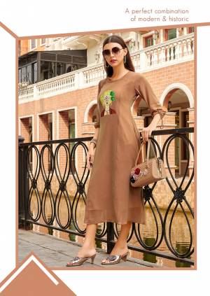 Here Is A Rich And Elegant Looking Readymade Kurti In Beige Color Fabricated On Georgette. It Is Beautified With Attractive Vintage Print Over The Front. 
