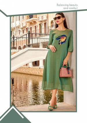 Simple and Elegant Looking Designer Readymade Kurti Is Here In Green Color Fabricated On Georgette. It Is Light In Weight And Easy To Carry All Day Long. 