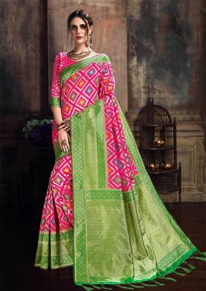 Look Pretty Wearing This Saree In Pretty Pink And Green Color Paired With Pink And Green Colored Blouse. This Saree And Blouse Are Fabricated On Banarasi Poly Silk Beautified  With Weave. It Is Durable And Easy To Drape. 