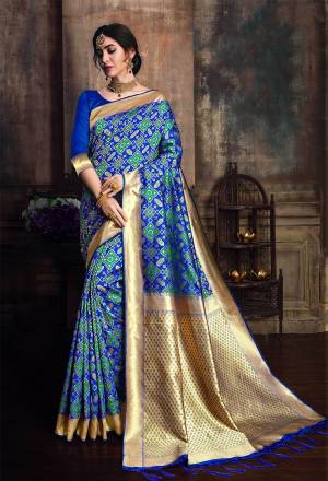 Bright And Visually Appealing Color Is Here With This Designer Saree In Royal Blue Color Paired With Royal Blue Colored Blouse. This Saree And Blouse Are Fabricated On Banarasi Poly silk Beautified With Weave, Buy Now.