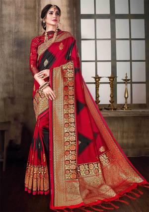 Adorn The Pretty Angelic Look Wearing This Lovely Red Colored Saree Paired With Red Colored Blouse. This Saree And Blouse Are Fabricated On Banarasi Poly Silk Beautified With Weave All Over It. It Is Light Weight And Easy To Carry All Day Long. 