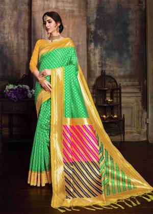 Celebrate This Fetive Wearing This Designer Silk Based Saree In Yellow Color Paired With Yellow Colored Blouse. This Saree And Blouse Are Fabricated On Banarasi Poly Silk Beautified With Weave. Buy This Saree Now.