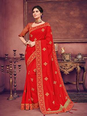 Wear this red color two tone silk fabrics saree. Ideal for party, festive & social gatherings. this gorgeous saree featuring a beautiful mix of designs. Its attractive color and heavy designer embroidered saree, paper mirror design, stone design, beautiful floral design all over work over the attire & contrast hemline adds to the look. Comes along with a contrast unstitched blouse.
