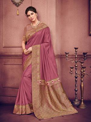 Look your ethnic best by wearing this Onion Pink color two tone silk fabrics saree. Ideal for party, festive & social gatherings. this gorgeous saree featuring a beautiful mix of designs. Its attractive color and heavy designer embroidered saree, patch design, stone design, beautiful floral design all over work over the attire & contrast hemline adds to the look. Comes along with a contrast unstitched blouse.