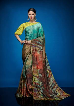 Rich And Elegant Looking Designer Printed Saree Is Here Fabricated On Crepe Silk Paired With Crepe Silk Fabricated Blouse. It Is Beautified With Abstract Prints All Over It.