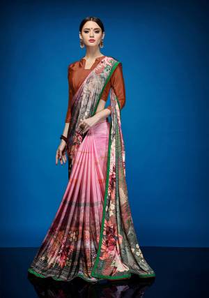 Rich And Elegant Looking Designer Printed Saree Is Here Fabricated On Crepe Silk Paired With Crepe Silk Fabricated Blouse. It Is Beautified With Abstract Prints All Over It.