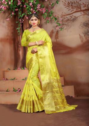 This Festive Season, Adorn A Pretty Look With Comfort Wearing This Saree Fabricated On Cotton Silk Beautified With Weave All Over It. This Saree Is Light Weight And Easy To Drape. Buy Now.