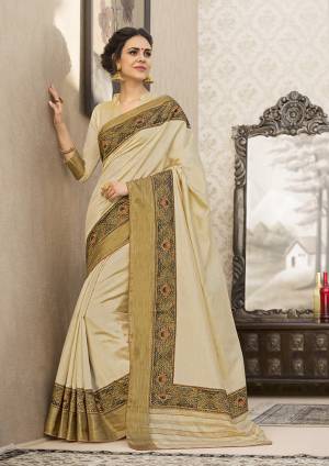 Rich And Elegant Looking Saree Is Here In Cream Color Paired With Cream Colored Blouse. This Saree And Blouse Are Fabricated On Art Silk Beautified With Printed Lace Border. Buy Now.