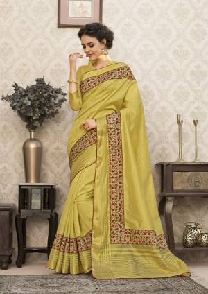 New Shade Is Here To Add Into Your Wardrobe With This Saree In Pear Green Color Paired With Pear Green Colored Blouse. This Saree And Blouse Are Fabricated On Art Silk Beautified With Printed Lace Border. 