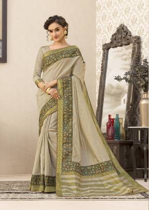Rich And Elegant Looking Saree Is Here In Grey Color Paired With Grey Colored Blouse. This Saree And Blouse Are Fabricated On Art Silk Beautified With Printed Lace Border. Buy Now.