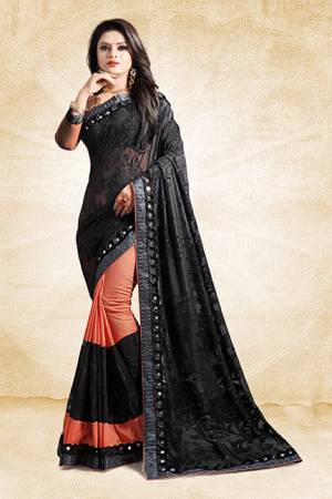 Get Ready For The Next Party At Your Place With This Designer Saree In Peach And Black Color Paired With Peach Colored Blouse. This Saree Is Fabricated On Art Silk And Brasso Paired With Art Silk Fabricated Blouse. Its Unique Pattern Will Earn You Lots Of Compliments From Onlookers. 