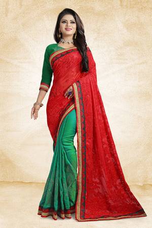 Go Colorful With This Pretty Bright Color Pallete Designer Saree In Red And Green Color Paired With Green Colored Blouse. This Saree Is Fabricated On Brasso And Satin Silk Paired With Art Silk Fabricated Blouse. It Has Very Attractive Stone Work Over The Saree Panel. 
