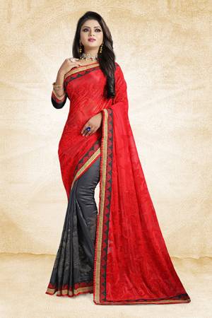 Go Colorful With This Pretty Bright Color Pallete Designer Saree In Red And Grey Color Paired With Grey Colored Blouse. This Saree Is Fabricated On Brasso And Satin Silk Paired With Art Silk Fabricated Blouse. It Has Very Attractive Stone Work Over The Saree Panel. 