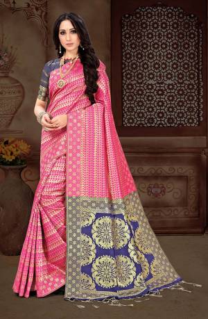 Presenting this pink colored saree, which will make you look striking and even more beautiful. Made of art silk with heavy zari woven work, this saree is quite comfortable to wear and easy to drape as well. 