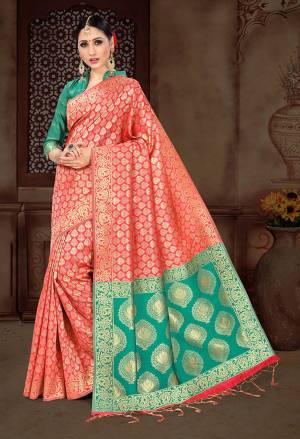 For A Bold And Beautiful Look Grab This Saree In Dark Peach Color Paired With Sea Green Colored Blouse. It Is Fabricated On Art Silk Beautified With Attractive And Heavy Weaving All Over It.