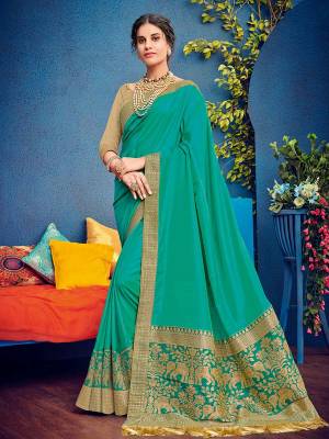 Flaunt a new ethnic look wearing this Sea green color two tone silk fabrics saree. Ideal for party, festive & social gatherings. this gorgeous saree featuring a beautiful mix of designs. Its attractive color and heavy designer embroidered and silk saree, stone design, beautiful floral design all over work over the attire & contrast hemline adds to the look. Comes along with a contrast unstitched blouse.