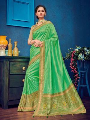 Classy, sensuous and versatile are the perfect words to describe this green color two tone silk fabrics saree. Ideal for party, festive & social gatherings. this gorgeous saree featuring a beautiful mix of designs. Its attractive color and heavy designer embroidered and silk saree, stone design, beautiful floral design all over work over the attire & contrast hemline adds to the look. Comes along with a contrast unstitched blouse.
