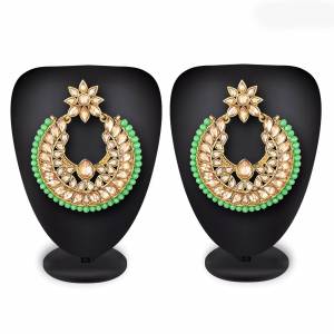 For An Attractive Look, Pair up This Beautiful Pair Of Earrings In Golden Color Which Can Be Paired With Any Colored Ethnic Attire. It Is Light In Weight And Easy To Carry All Day Long.