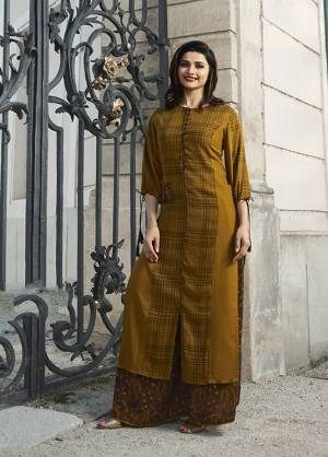 Celebrate This Festive Season Wearing This Designer Readymade Plazzo Set In Musturd Yellow Colored Kurti Paired With Brown Colored Plazzo. This Kurti And Plazzo Are Fabricated On Rayon Beautified With Prints. This Readymade Pair Is Available In All Regular Sizes. Buy Now. 