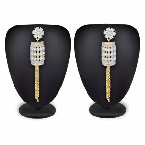Rich And Elegant Looking Designer Earring Set Is Here In Golden Color Beautified With Stone Work. It IS Light Weight And Can Be Paired With Any Colored Attire. 