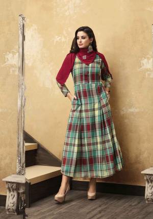 Grab This Pretty Checks Printed Readymade Designer Kurti In Multi Color Paired With A Very Pretty Maroon Colored Embroidered Scarf. This Kurti Is Fabricated O Muslin Paired With Rayon Fabricated Scarf. Buy Now.