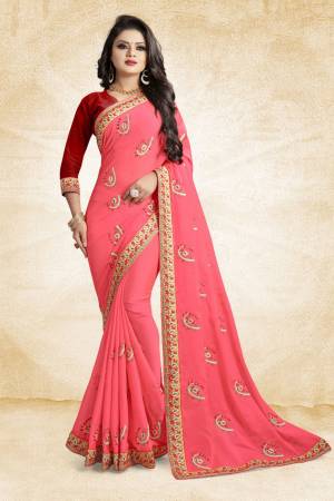 Celebrate This Festive Season With Beauty And Comfort Wearing This Designer Saree In Fuschia Pink Color Paired With Contrasting Red Colored Blouse. This Saree And Blouse Are Silk Based Beautified With Embroidered Butti All Over It. It Is Easy to Drape And Durable. 