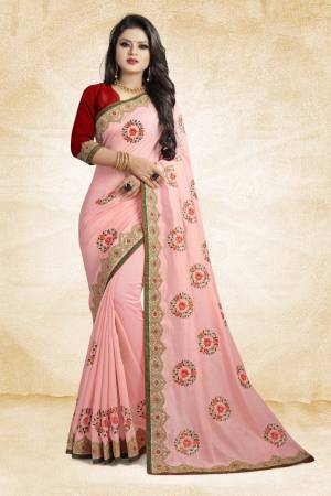 Look Pretty In This Rich And Elegant Looking Designer Saree In Light Pink Color Paired With Contarsting Maroon Colored Blouse. This Saree And Blouse are Fabricated Silk Beautified With Embroidered Butti Work. Buy This Rich Looking Saree With Pretty Color Pallete Now.