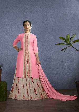 Look Pretty In this Lovely Girly Shade With This Designer Lehenga Suit In Pink Colored Top And dupatta Paired With Light Pink Colored Lehenga. Its Top Is Fabricated On Satin Paired With Chanderi Lehenga And Chiffon Fabricated Dupatta. Buy This Now.