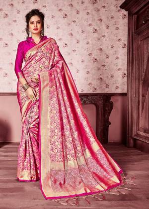 For a Bold And Beautiful Look, Grab This Heavy Woven Designer Silk Based Saree In Rani Pink And Gold Color Paired With Rani Pink Colored Blouse. This Saree Is Fabricated On Kanjivaram Art Silk Paired With Art Silk Fabricated Blouse. It Is Beautified With Heavy Weave All Over The Saree.