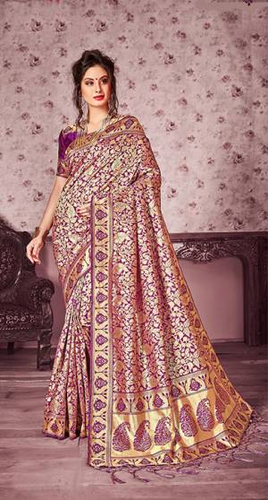 For a Bold And Beautiful Look, Grab This Heavy Woven Designer Silk Based Saree In Purple And Gold Color Paired With Purple Colored Blouse. This Saree Is Fabricated On Kanjivaram Art Silk Paired With Art Silk Fabricated Blouse. It Is Beautified With Heavy Weave All Over The Saree.